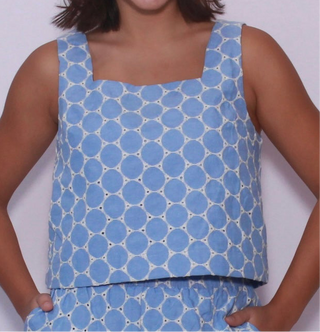 Embroidered eyelet waist-length sleeveless pullover top