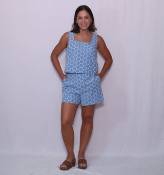 Embroidered eyelet waist-length sleeveless pullover top