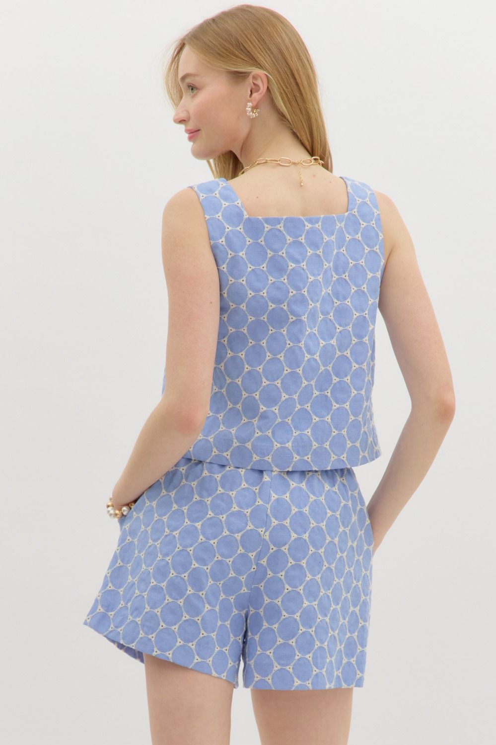 Embroidered eyelet waist-length sleeveless pullover top