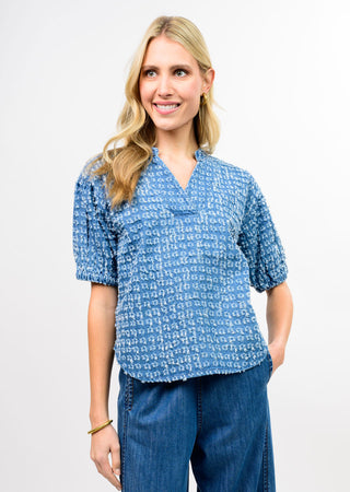 Ivy Jane Indigo Clip Dot Top showing the raised clip dot texture and boxy relaxed fit