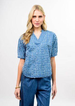 Ivy Jane Indigo Clip Dot Top front view styled with denim