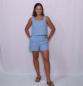 Embroidered eyelet waist-length sleeveless pullover top