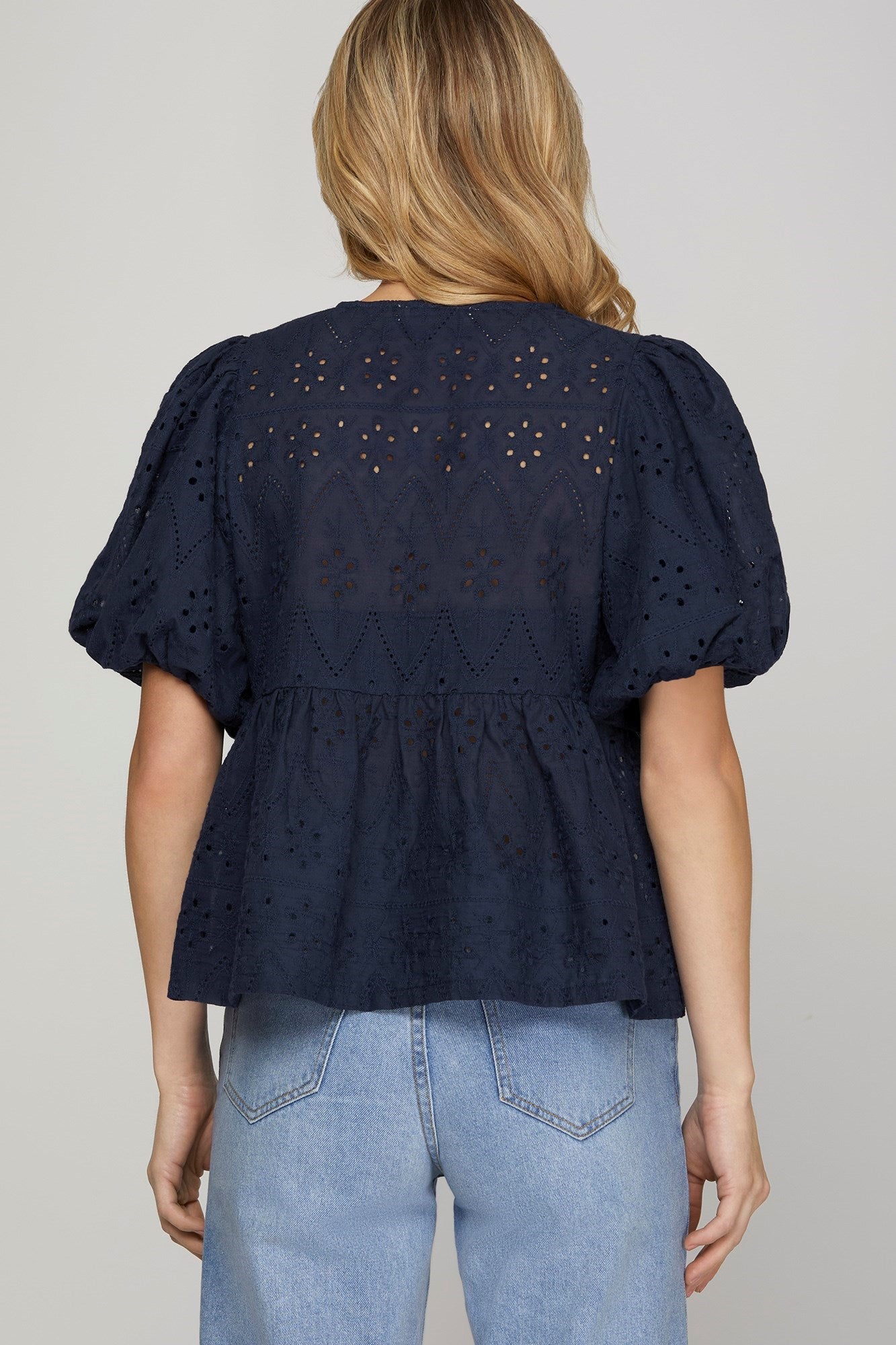 PUFF SLEEVE BOW FRONT TIE EYELET PEPLUM TOP