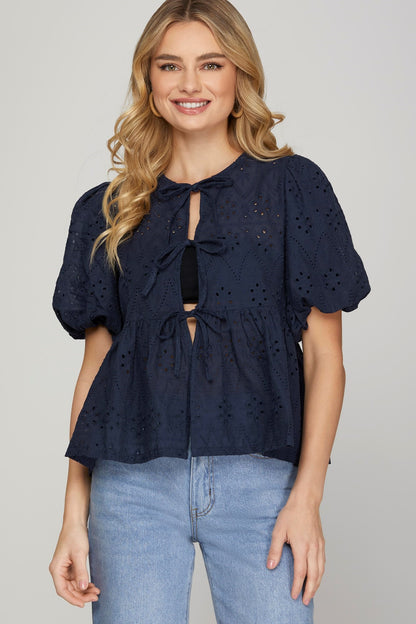 PUFF SLEEVE BOW FRONT TIE EYELET PEPLUM TOP