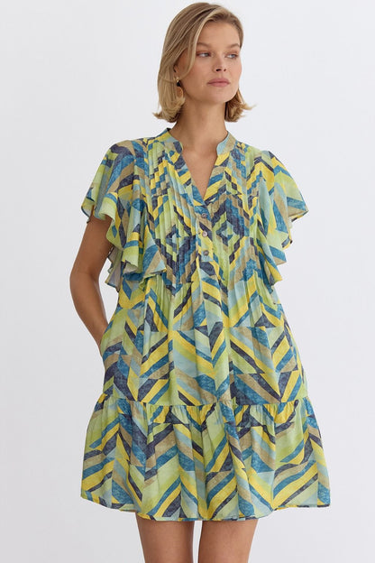 Printed flutter sleeve mini dress featuring pocket at sides.