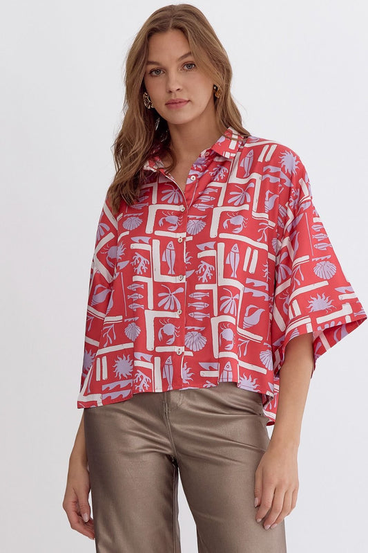 Printed button down collared half sleeve top.