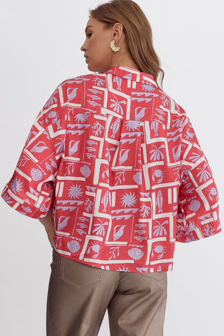 Printed button down collared half sleeve top.