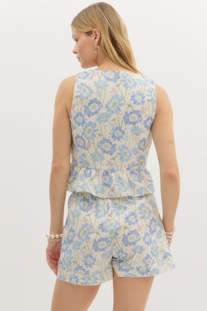 Floral print sleeveless ruffle hem top