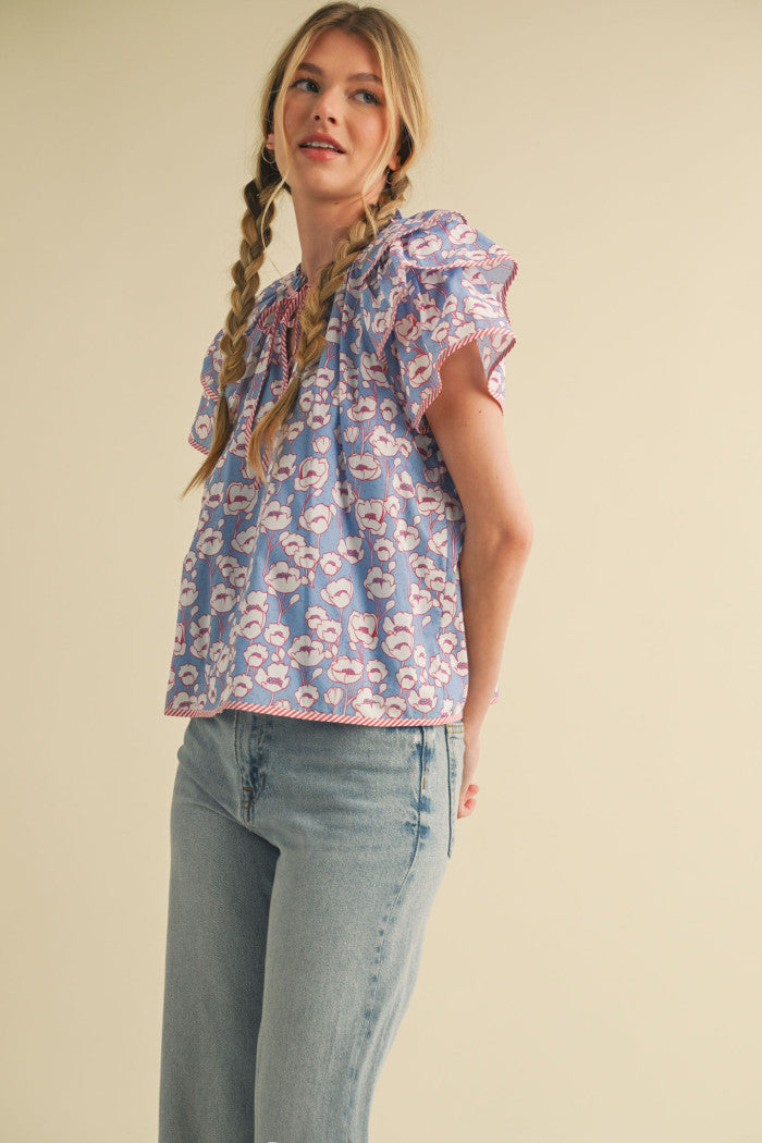 Floral flutter sleeve top